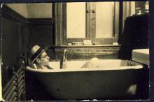 <p>c1932-35 - George Whalley reading in the bath at “Old Lodge”, Bishop’s University</p>