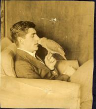 <p>c1935 - George Whalley with Beaky, his beloved parrot who is 66 years old at the time</p>